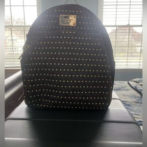 Michael Kors studded brown MK monogram with gold studs.